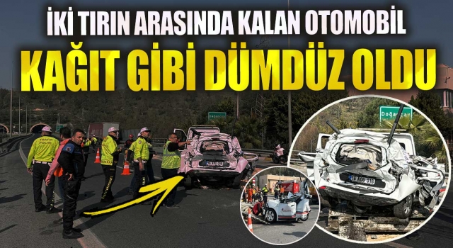 İzmir’de iki tırın arasında kalan otomobil ezildi